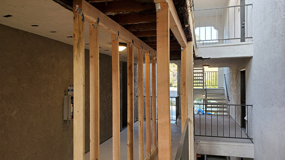 Newly framed portion of walkway for SB721 compliant repairs