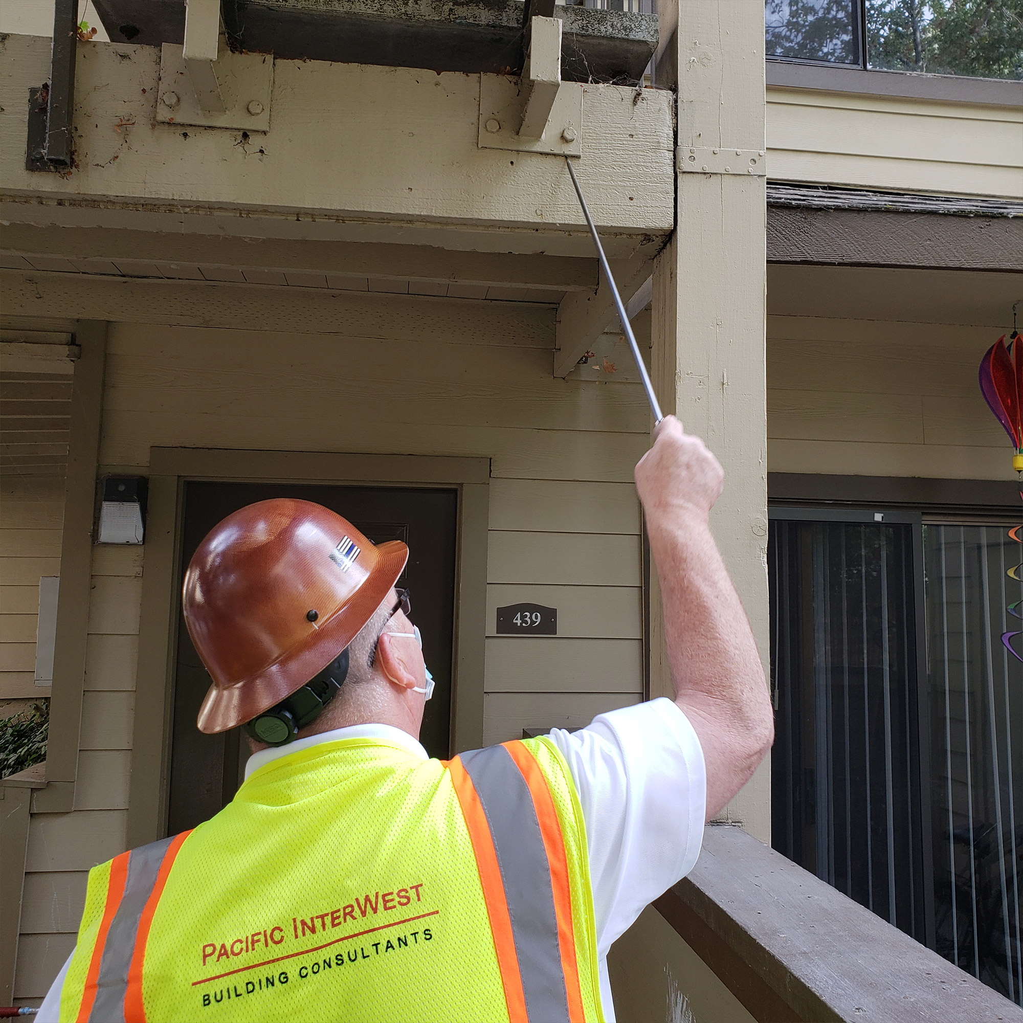 PIW inspecting balcony for SB721 compliance in CA